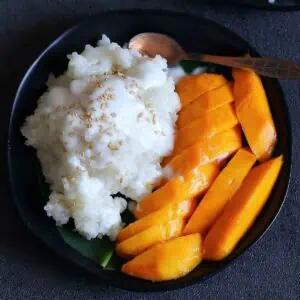 Thai Mango sticky rice on a plate.