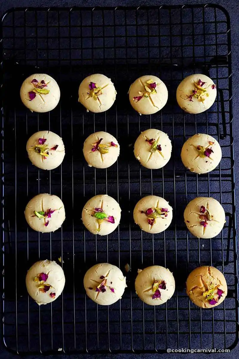 nankhatai cooling on a wire rack.