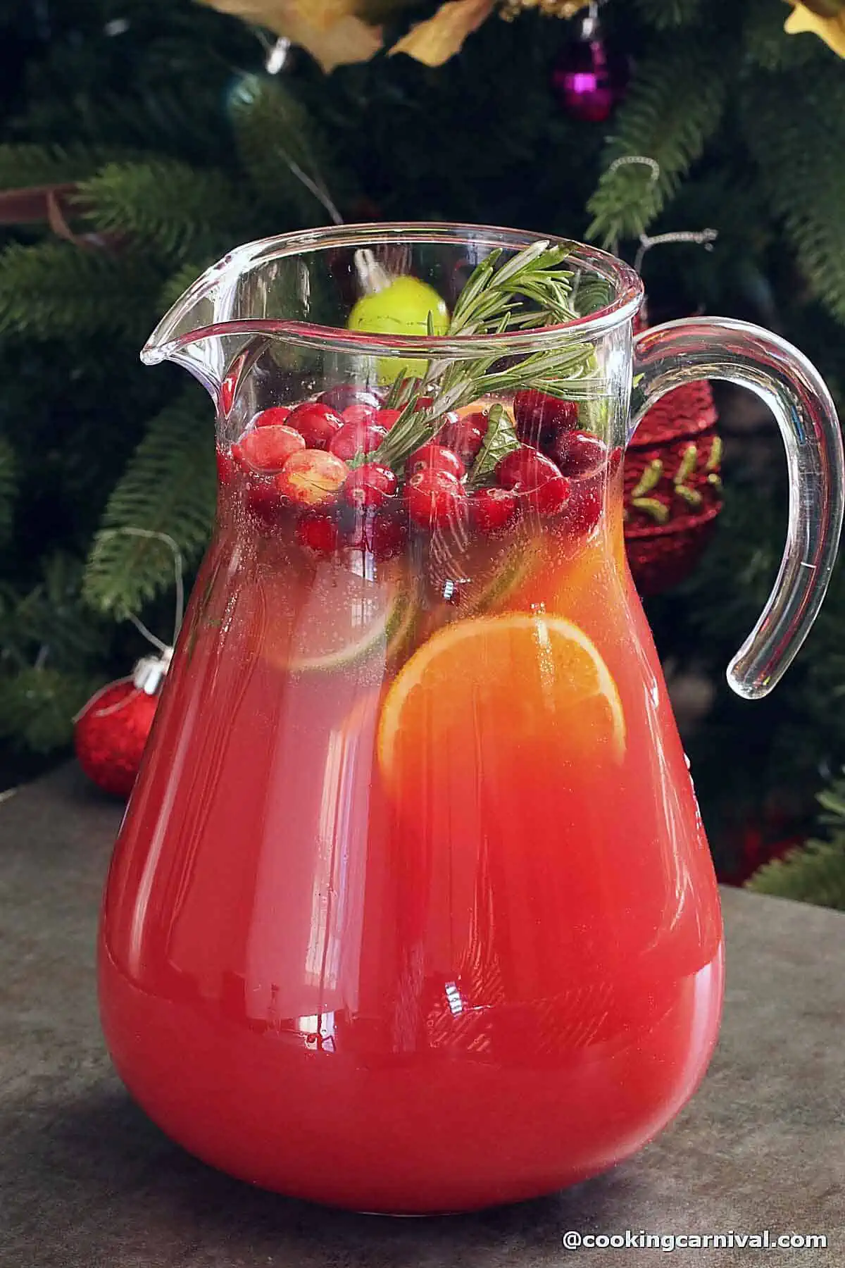 Virgin Christmas punch is ready in a jug.