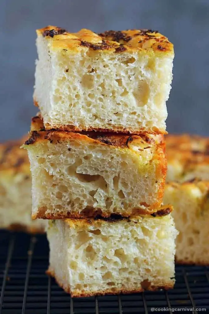 Stack of no knead pesto focaccia bread