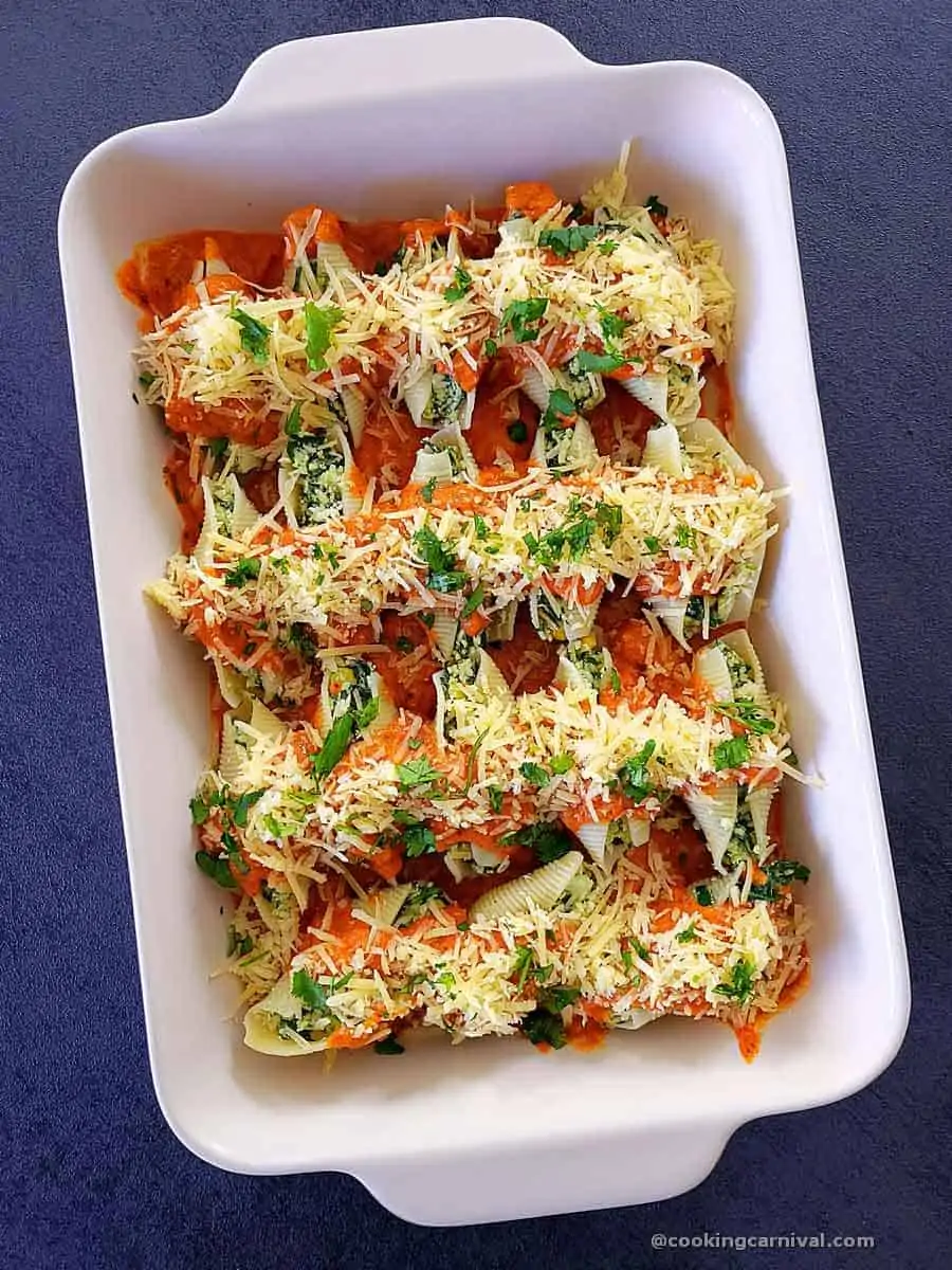 Stuffed shells in pan, ready to be baked