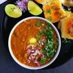 Pav bhaji in a bowl, ladi pav on side