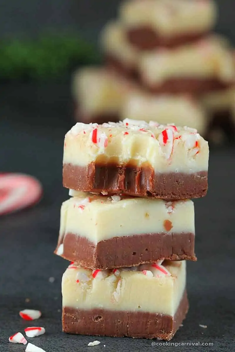 took a bite form Peppermint bark fudge and showing texture of the fidge