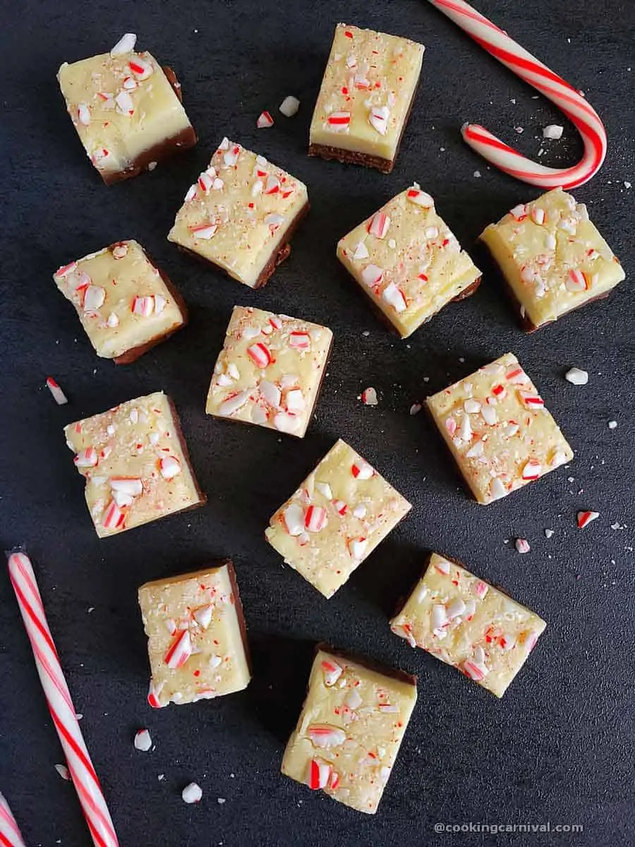 Peppermint bark fudge on a gray tile