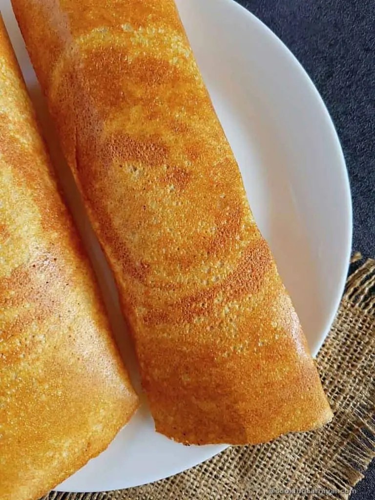 Showing crispy texture of instant dosa