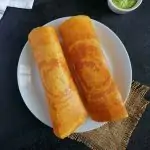 Quinoa and lentil dosa in a white plate