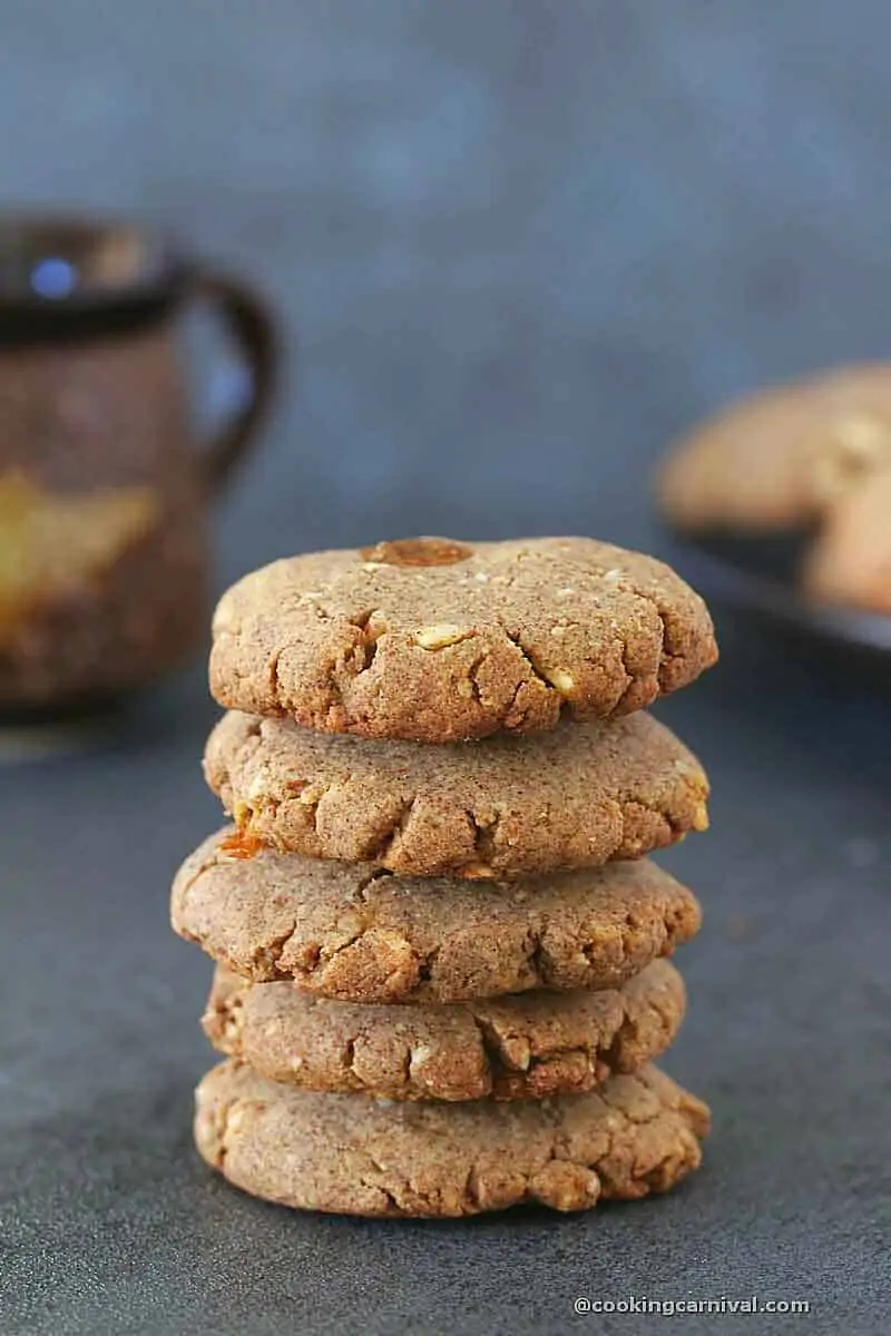 stacked Ragi cookies on a gray table