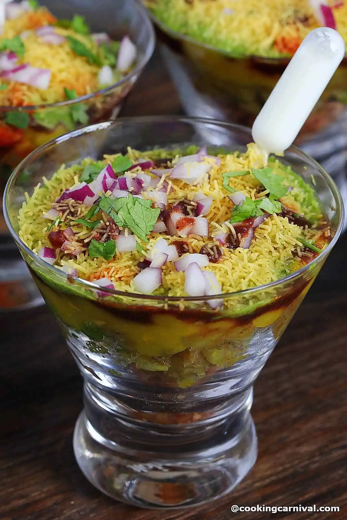 close up shot of samosa chaat served in cup.