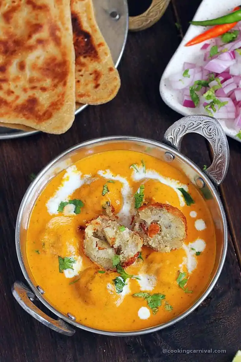 showing inner stuffing of paneer kofta