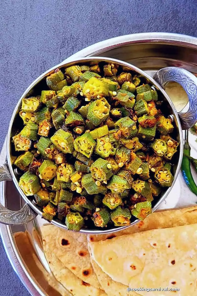 Bhindi masala in steel bowl