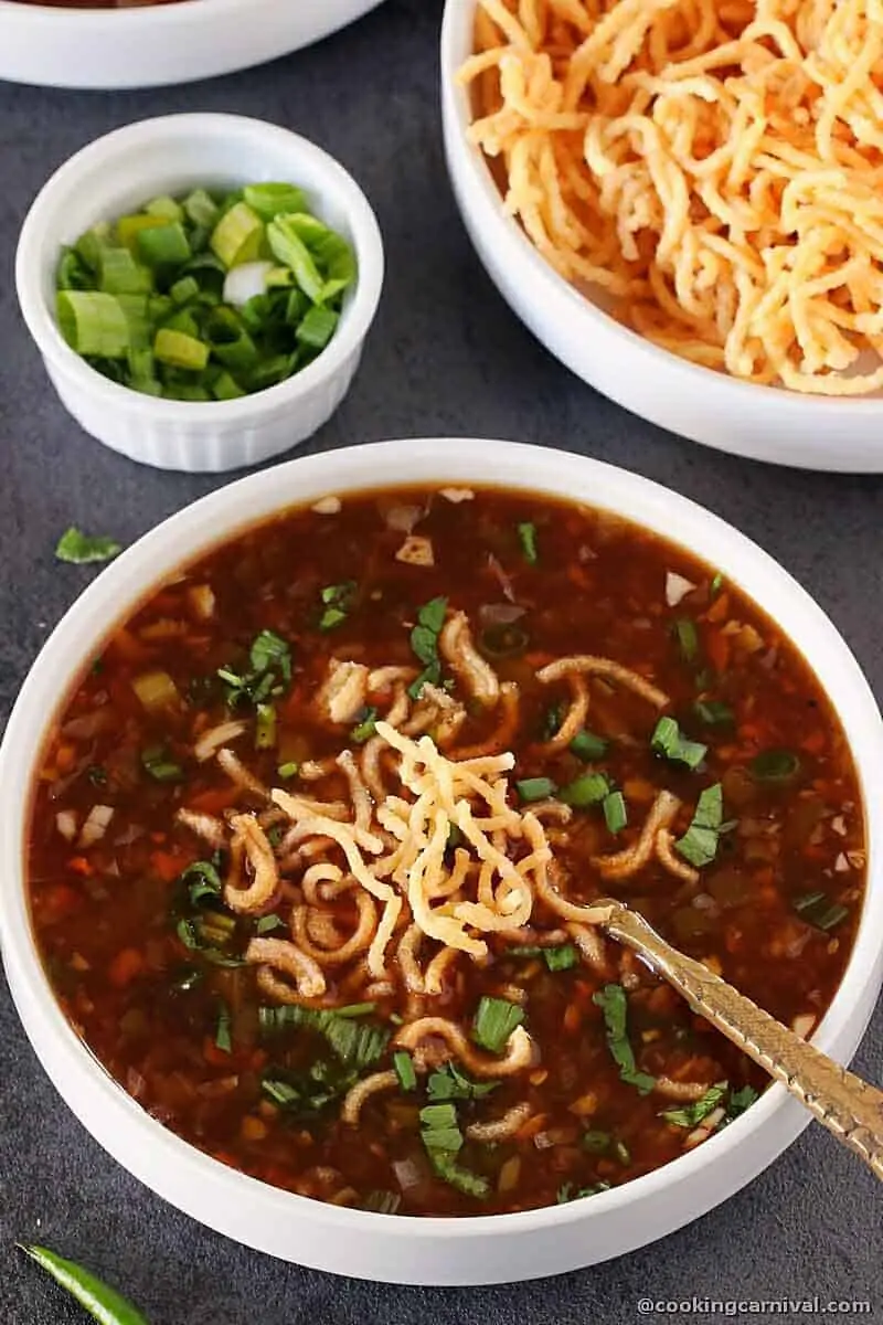 vegetable manchow soup in a white bowl