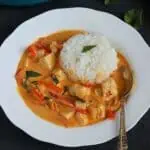 Vegan Panang curry with vegetables and tofu served with jasmine rice.